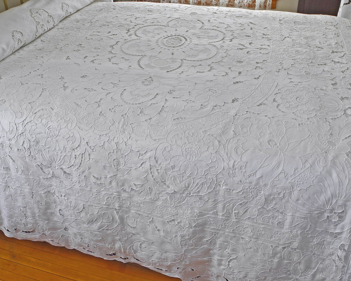 Bedcover. Elaborate hand embroidery on 100% linen. Different types of embroidery executed at its best.