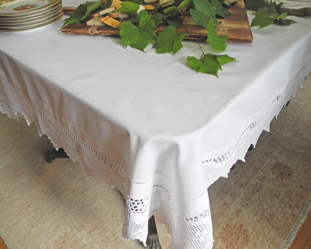 pure linen tablecloth decorated with hand drawn hemstitch and 10"wide hand crochet border in french country style.