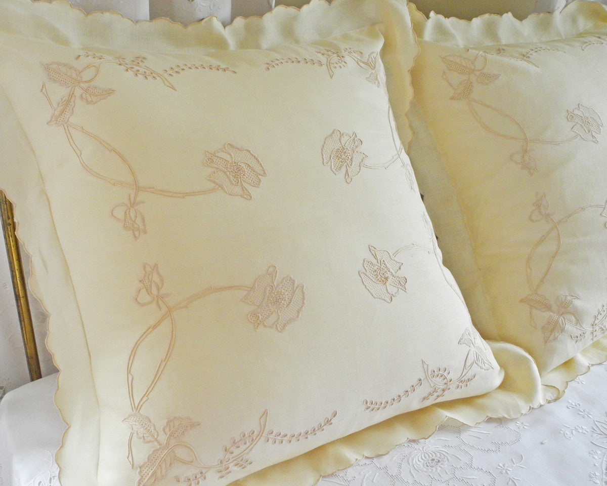European square sham, hand embroidered with graceful art noveau like floral motif. White or ecru.