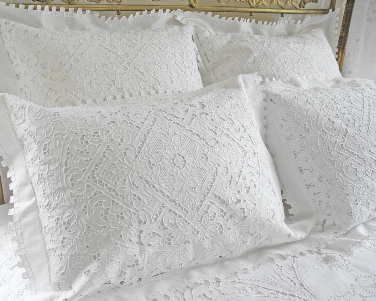 Standard pillow sham with very elaborate hand embroidery in cutwork and several types of drawnwork.