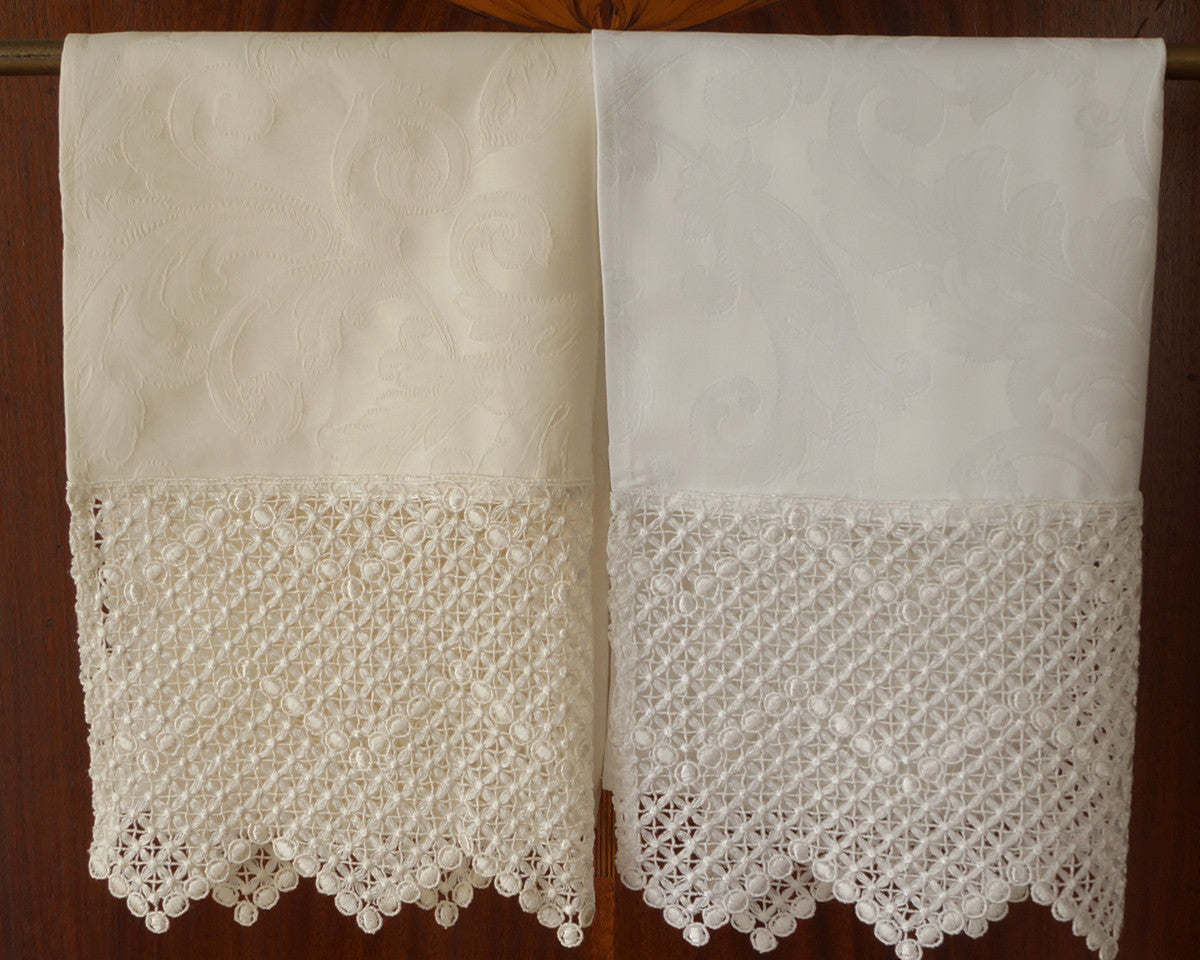 Delicate lace and high count Italian cotton damask are paired to create luxurious, generously sized guest towels.