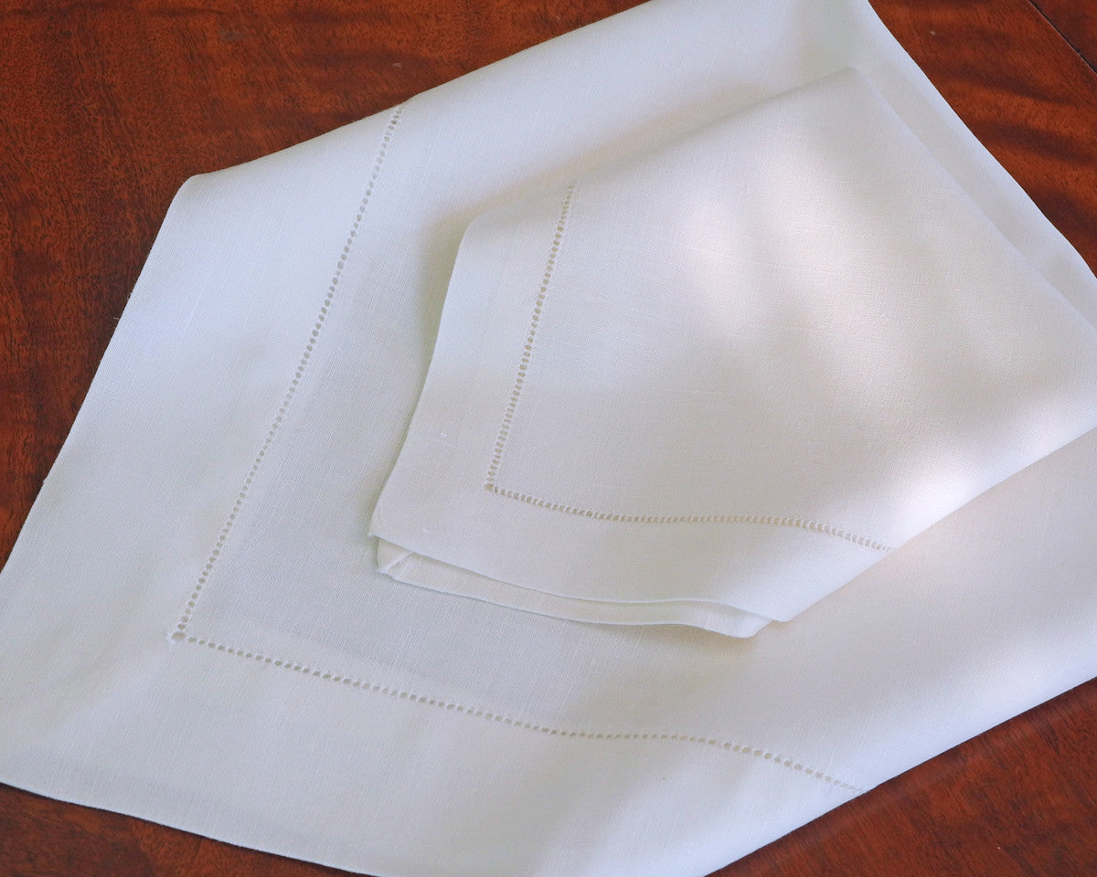 White linen/cotton napkin with hand drawn hemstitch.