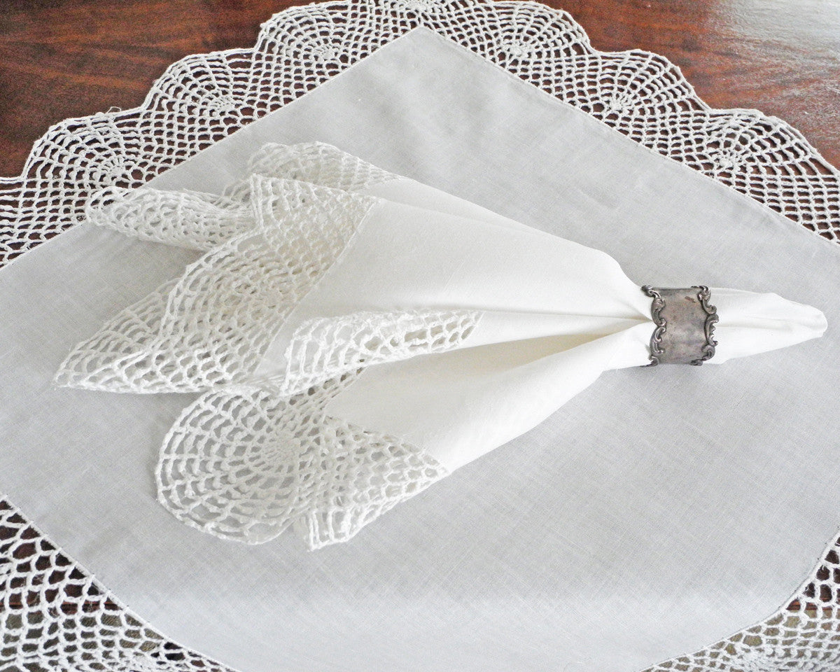 Large dinner napkin in linen/cotton blend with hand crochet border.