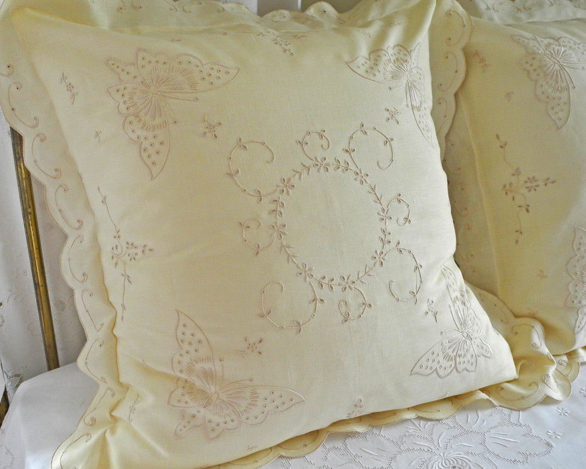 European square pillow sham in 100% linen. Hand embroidered with butterfly motif in each corner.