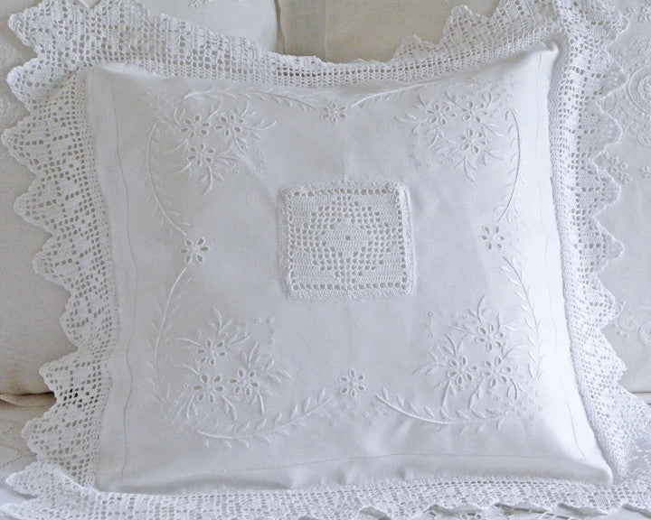 18" square pillow sham hand embroidered and embellished with crochet border and center inset.