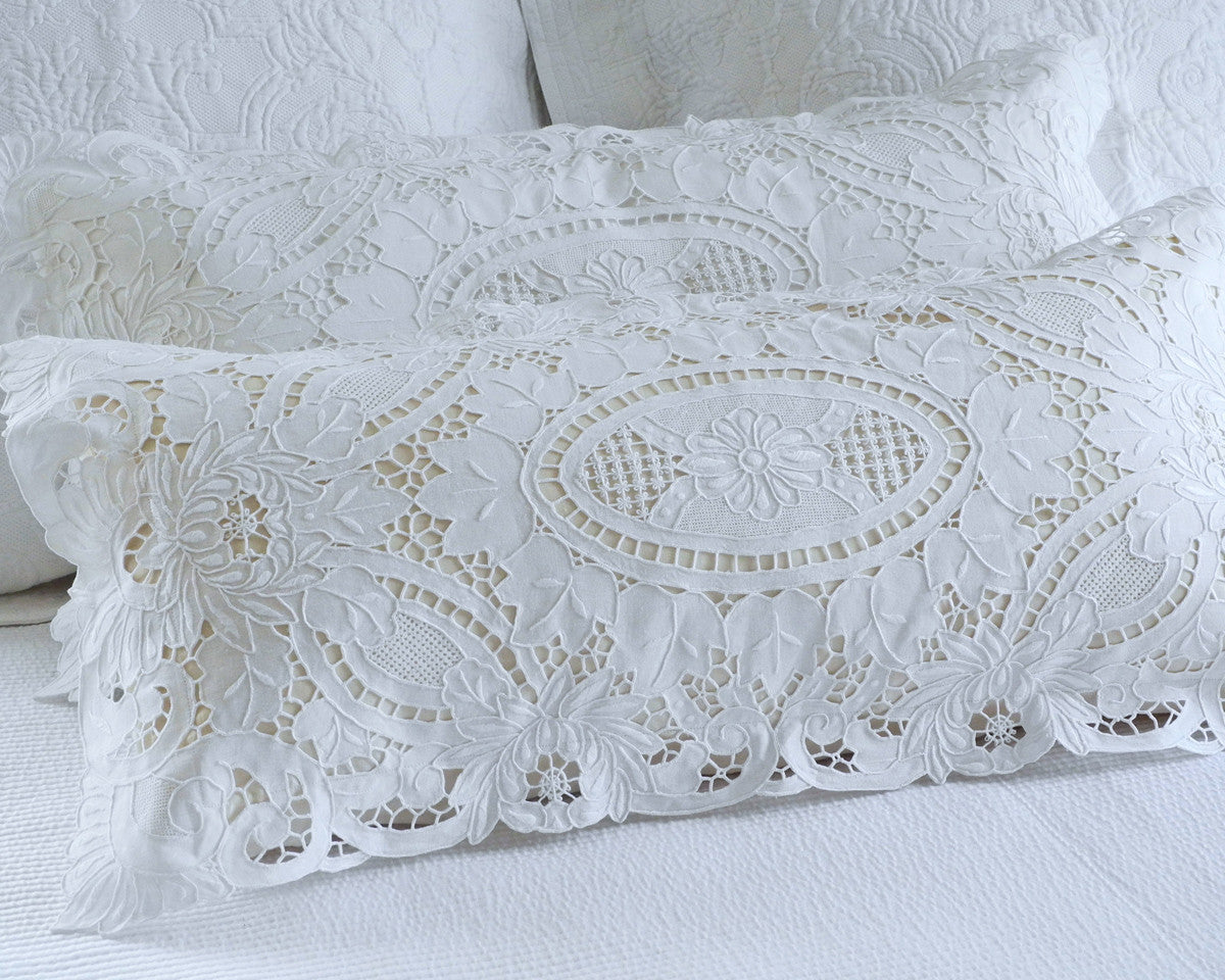 Bolster pillow sham in 14"x 28" exquisitely embroidered by hand with a variety of embroidery styles. Truly a heirloom piece. 