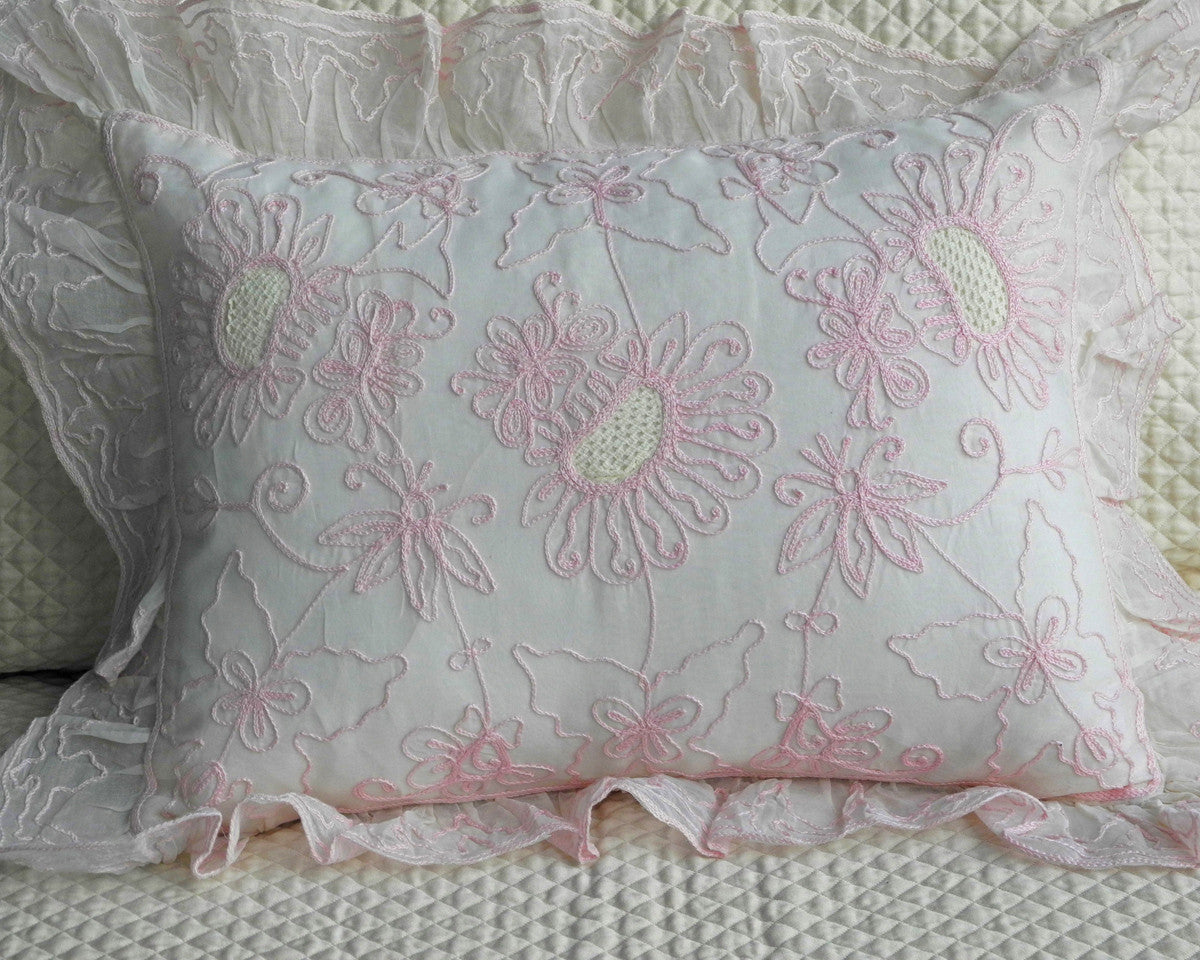 Boudoir size pillow sham, embroidered in pink yarn on ecru organdy. Framed with embroidered ruffle,