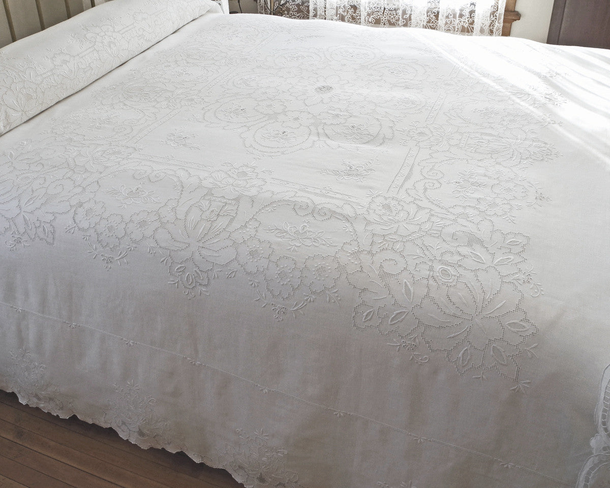 Classic, vintage quality drawn work embroidery is featured in this bedcover that measures 106" x 92" approximatelly.